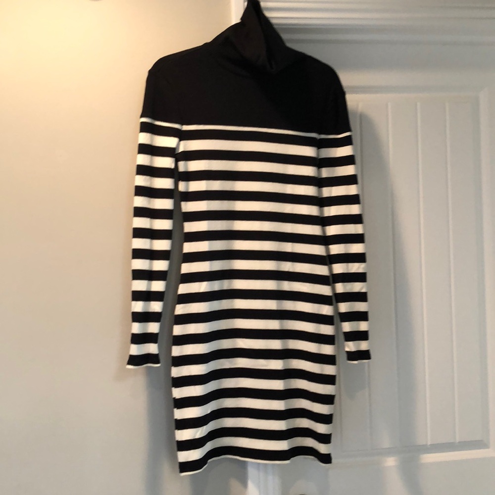 Cute black and cream stripped long sleeve dress size small. Maison Jules